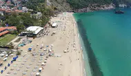 Alanya’da Güneşi Gören Plaja Koştu! Kleopatra Plajı Doldu Taştı