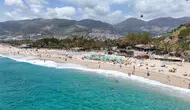 Alanya’da Yaz Erken Geldi! Kleopatra Plajı’nda Yoğunluk Dikkat Çekti