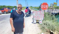 Adana'da Tehlikeli Kavşak: Vatandaş Kendi Tabelasıyla Önlem Aldı