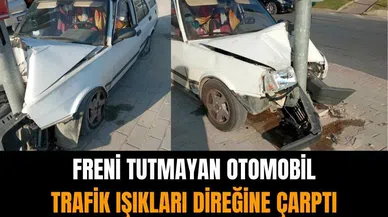 Freni tutmayan otomobil trafik ışıkları direğine çarptı