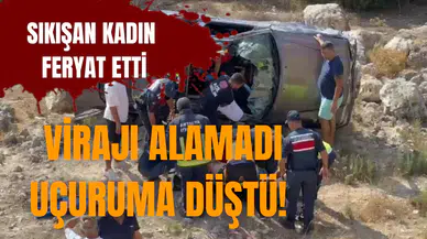 Virajı alamadı uçuruma düştü! sıkışan kadın feryat etti