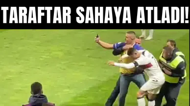 Ronaldo ile fotoğraf çekinmek için sahaya atladı
