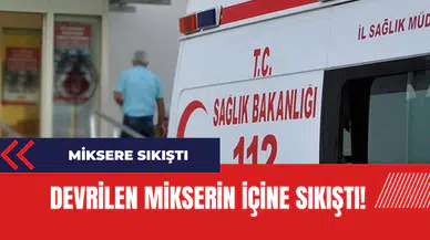 Devrilen mikserin içine sıkıştı!