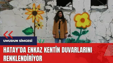 Hatay'da enkaz kentin duvarlarını renklendiriyor