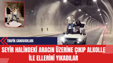 Trafik Canavarları: Seyir Halindeki Aracın Üzerine Çıkıp Alkolle ile Ellerini Yıkadılar