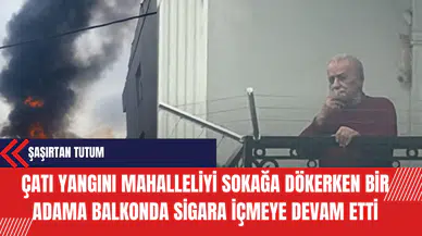 Çatı Yangını Mahalleliyi Sokağa Dökerken Bir Adama Balkonda Sigara İçmeye Devam Etti