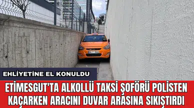 Etimesgut'ta alkollü taksi şoförü polisten kaçarken aracını duvar arasına sıkıştırdı