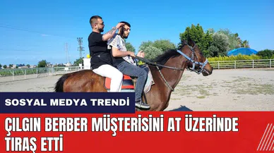 Çılgın berber müşterisini at üzerinde tıraş etti