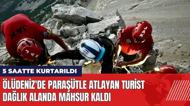 Ölüdeniz'de paraşütle atlayan turist dağlık alanda mahsur kaldı