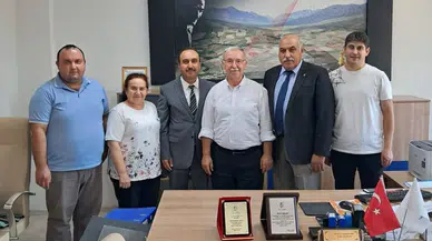 Çeltikçi Tapu Müdürü Özcan Taşçılar Plaketle Emekliliğe Uğurlandı