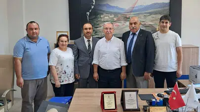 Çeltikçi Tapu Müdürü Özcan Taşçılar Plaketle Emekliliğe Uğurlandı