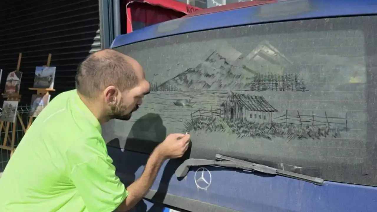 antalyada-isitme-engelli-alper-tozlu-arac-camlarini-sanata-donusturuyor